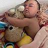 Sunflower joined the competition — help win amazing prizes! baby, sleeping, stuffed_animal, toy, blanket, child, cute, soft, cozy, nap, indoor, peaceful, adorable, plush, comfort, closeup, portrait, infant, rest, toddler
