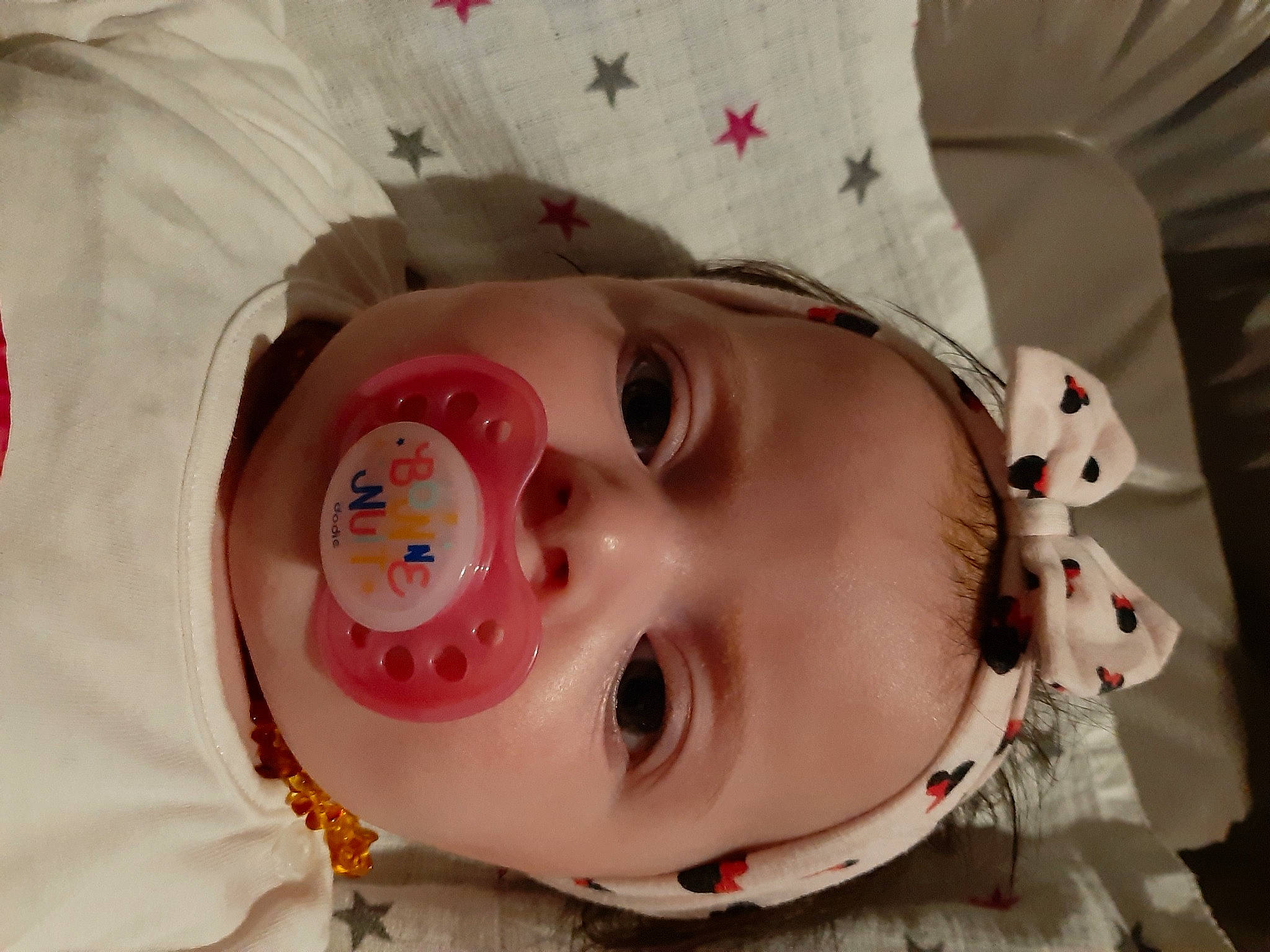 Inaya participe au concours pour gagner de l'argent avec cette photo : baby, baby_toddler_clothing, cheek, child, chin, eye, eyebrow, eyelash, face, facial_expression, hat, headgear, iris, lip, mouth, nose, person, pink, skin, smile