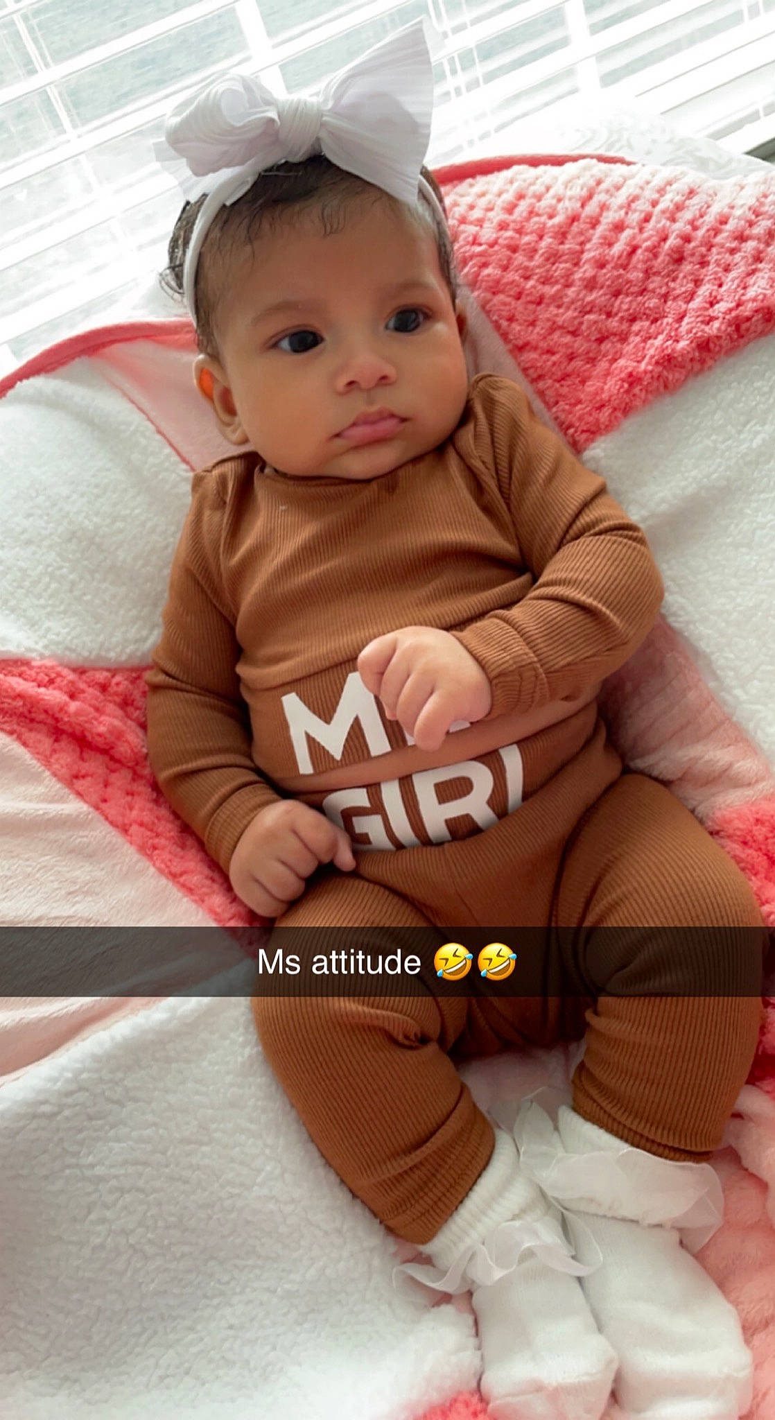 Gabriella joined the competition — help win amazing prizes! baby, baby_carriage, baby_toddler_clothing, cheek, child, comfort, face, finger, happy, human_body, human_leg, knee, leg, neck, person, pink, skin, sleeve, t_shirt, thigh