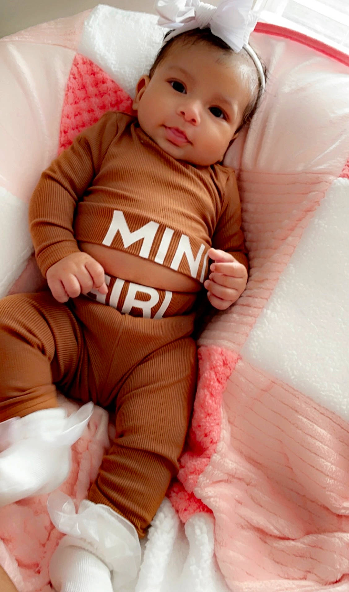 Gabriella joined the competition — help win amazing prizes! baby, baby_toddler_clothing, cheek, chin, comfort, eye, face, happy, head, knee, lip, mouth, neck, orange, person, pink, skin, sleeve, stomach, thigh