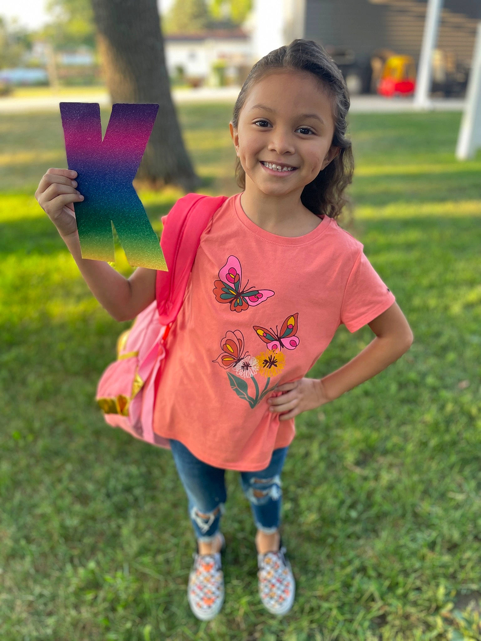 Mercedes joined the competition — help win amazing prizes! balloon, child, fun, gesture, grass, happy, head, joy, lawn, leaf, leisure, outdoor_recreation, people_in_nature, person, pink, plant, recreation, sleeve, smile, t_shirt