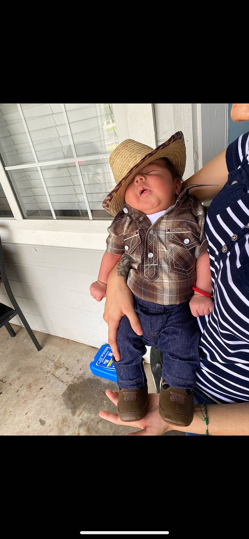 Christian is registered to the contest to win money with this photo: baby_toddler_clothing, child, cool, denim, fashion_accessory, flash_photography, fun, gesture, happy, hat, headwear, human_leg, pattern, person, shorts, sitting, sleeve, smile, sun_hat, t_shirt