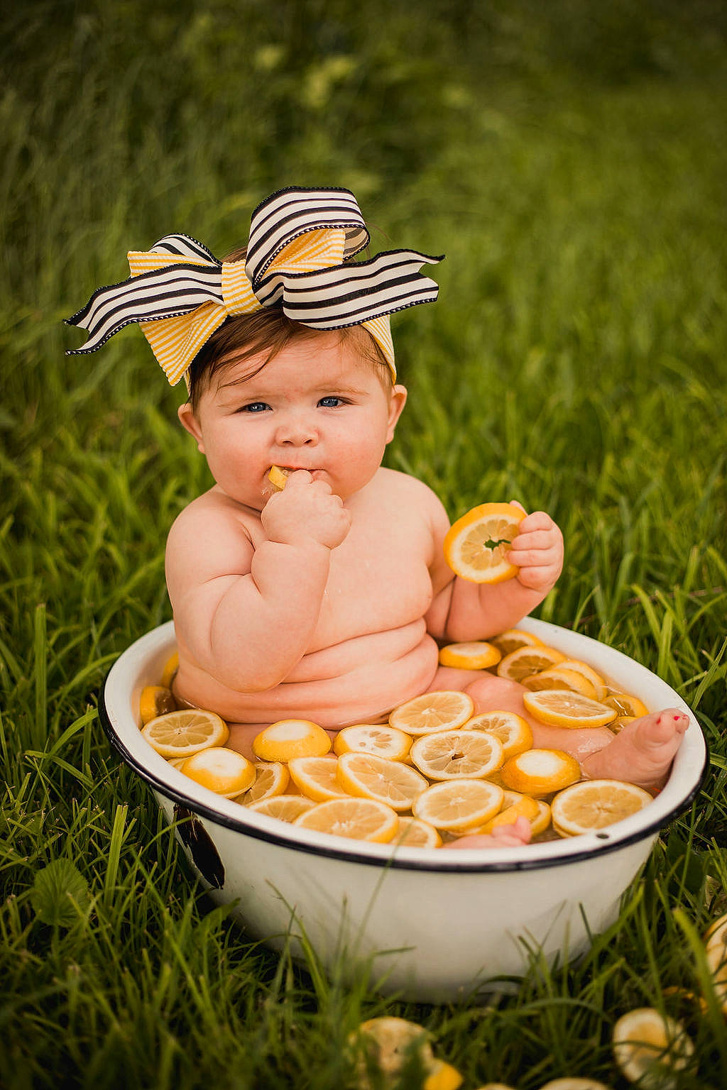 Vivian joined the competition — help win amazing prizes! baby, baby_products, baby_toddler_clothing, basket, bowl, cap, child, face, fashion_accessory, grass, happy, hat, jewellery, leisure, people_in_nature, person, plant, sitting, sun_hat, sweetness