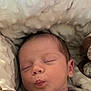 Maë participe au concours pour gagner de l'argent avec cette photo : newborn, baby, sleeping, blanket, cozy, soft, infant, face, puckered_lips, cute, child, closeup, rest, peaceful, warm, portrait, head, skin, young, snuggled