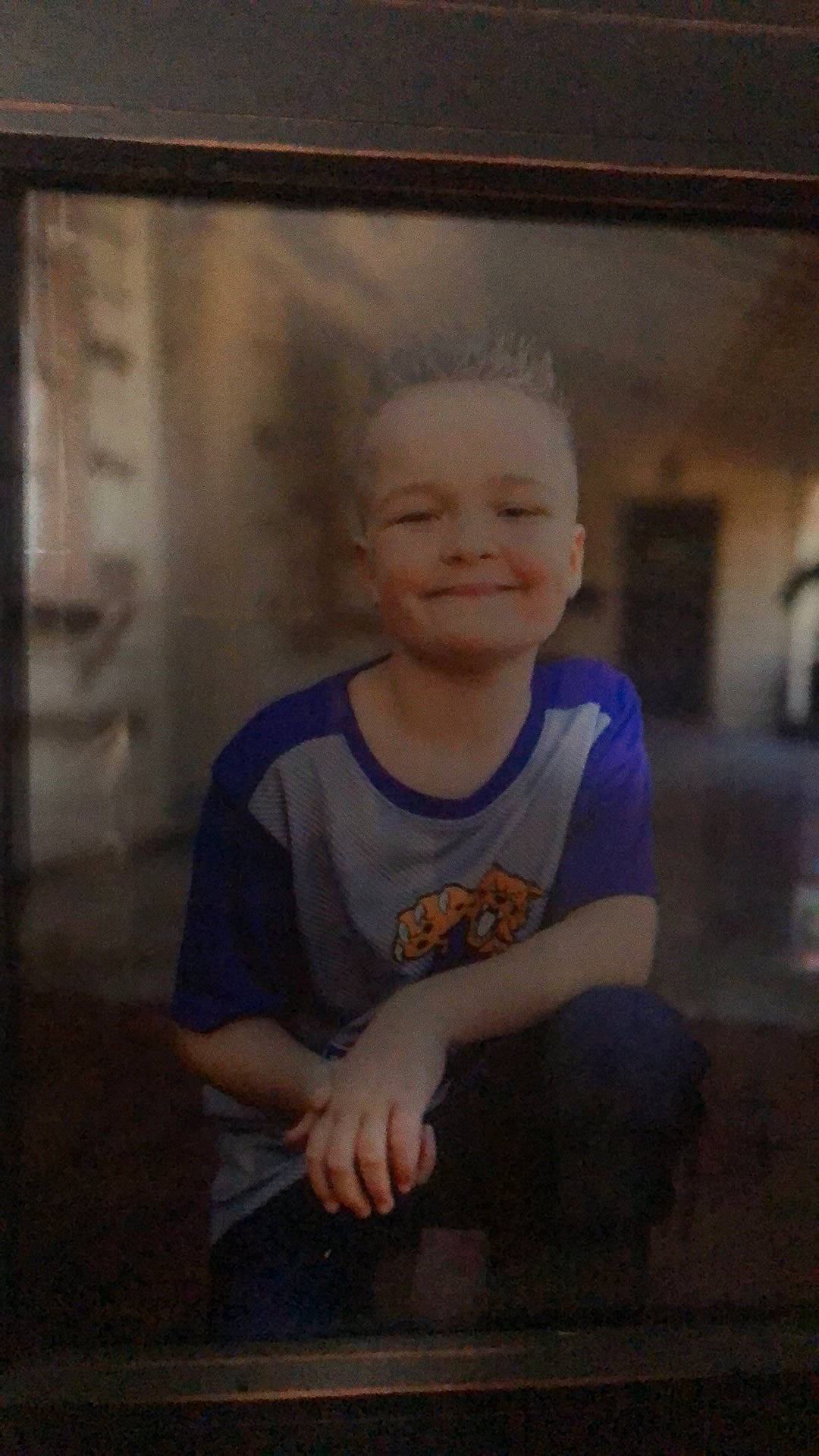 Justin is registered to the contest to win money with this photo: cheek, child, face, fun, joy, person, photograph, photography, portrait, smile, standing, toddler, wood