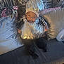 Niko joined the competition — help win amazing prizes! baby, child, couch, pillow, costume, silver, hat, smile, indoor, cute, person, clothing, adorable, sitting, face, headwear, furniture, home, cheerful, portrait
