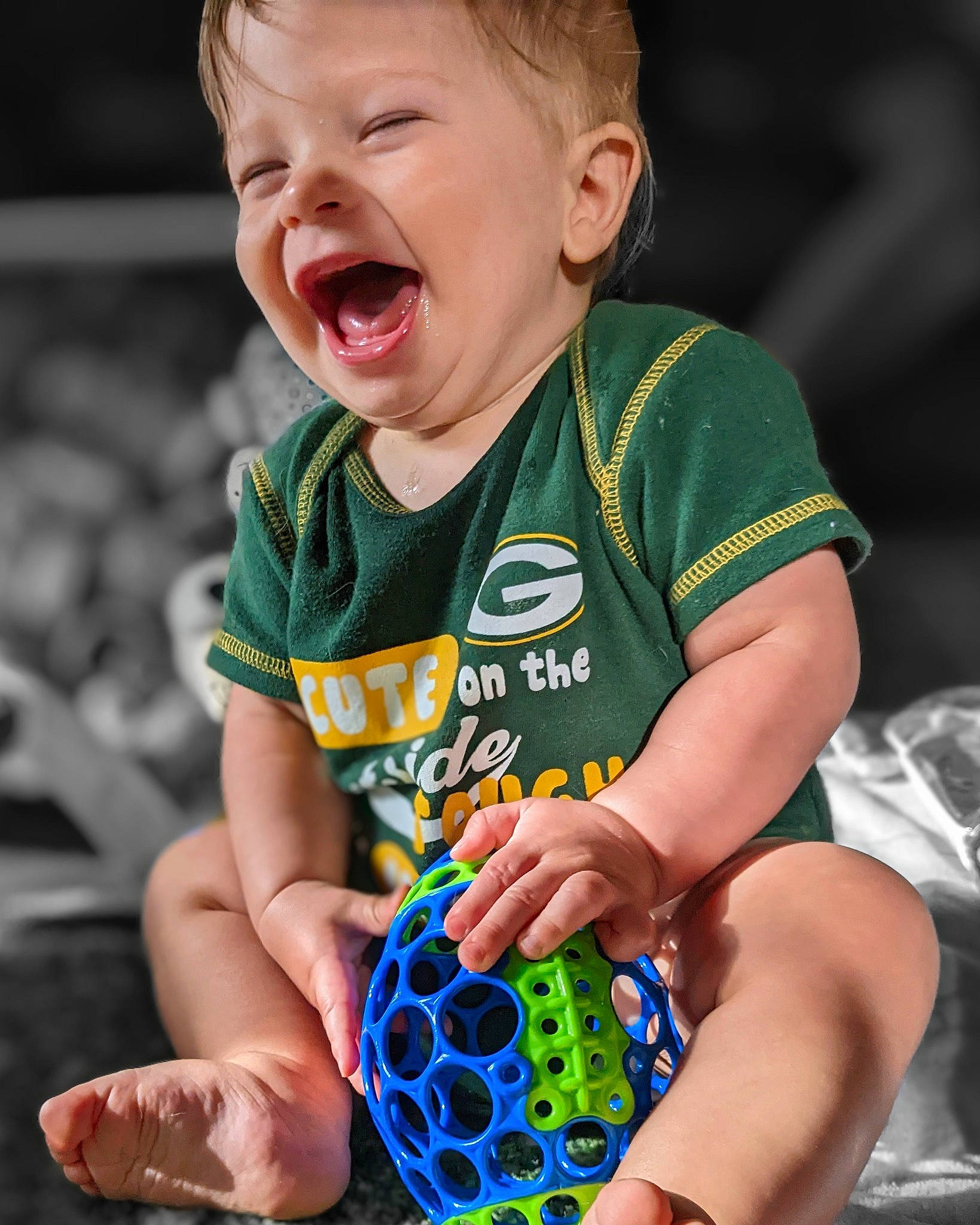 Lennox is registered to the contest to win money with this photo: baby_toddler_clothing, child, cool, finger, fun, grass, hand, happy, nail, neck, person, play, sleeve, sportswear, standing, summer, t_shirt, thigh, thumb, toddler