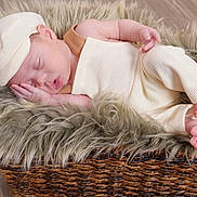 Lorenzo joined the competition — help win amazing prizes! baby, newborn, sleeping, hat, knitwear, blanket, fur, basket, cozy, infant, peaceful, soft, cute, resting, portrait, indoors, floor, tiny, child, toddler