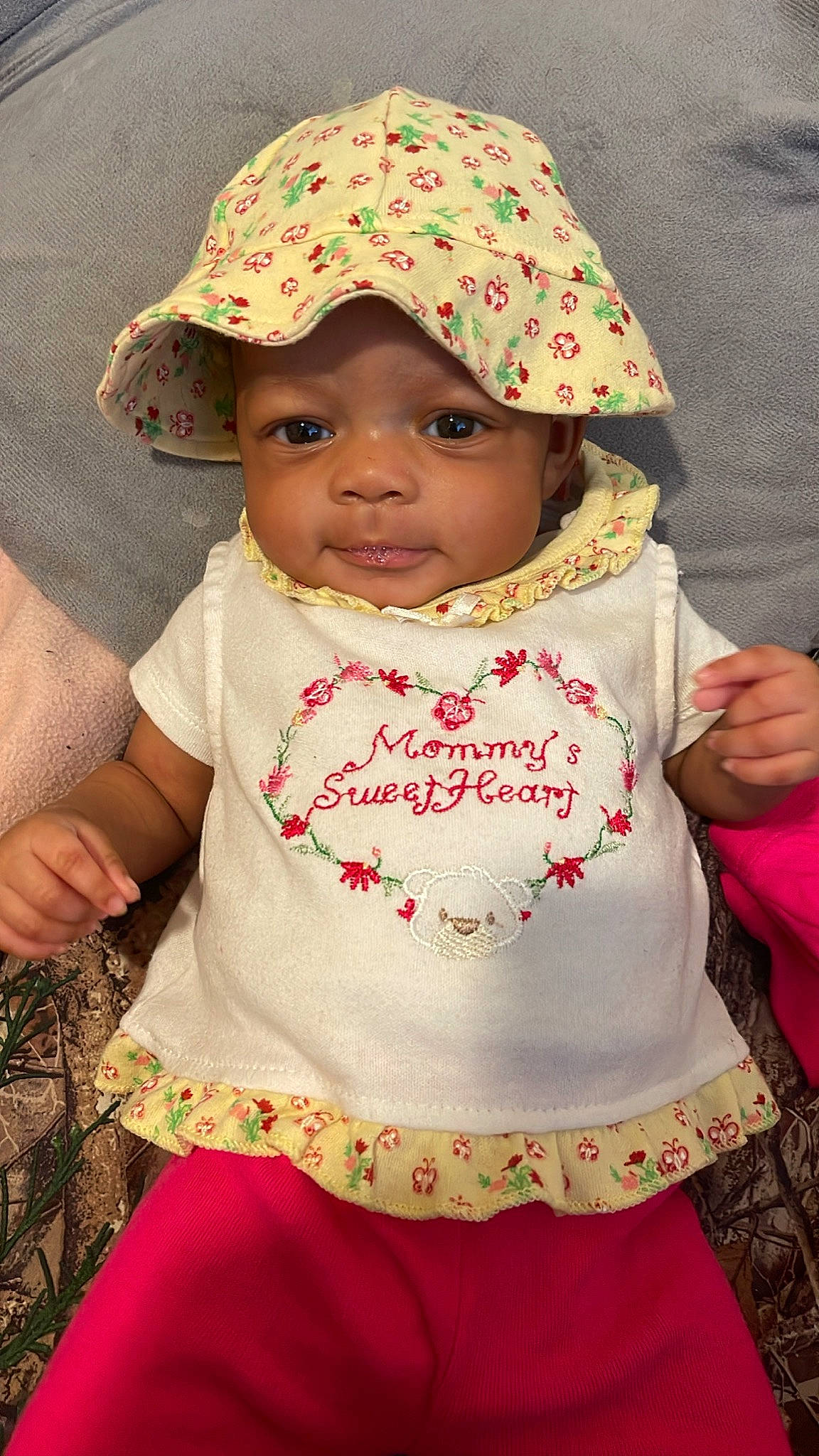 Baylee is registered to the contest to win money with this photo: baby, baby_toddler_clothing, cap, cheek, chin, eye, face, green, happy, hat, head, headwear, lip, neck, organ, person, pink, skin, sleeve, textile