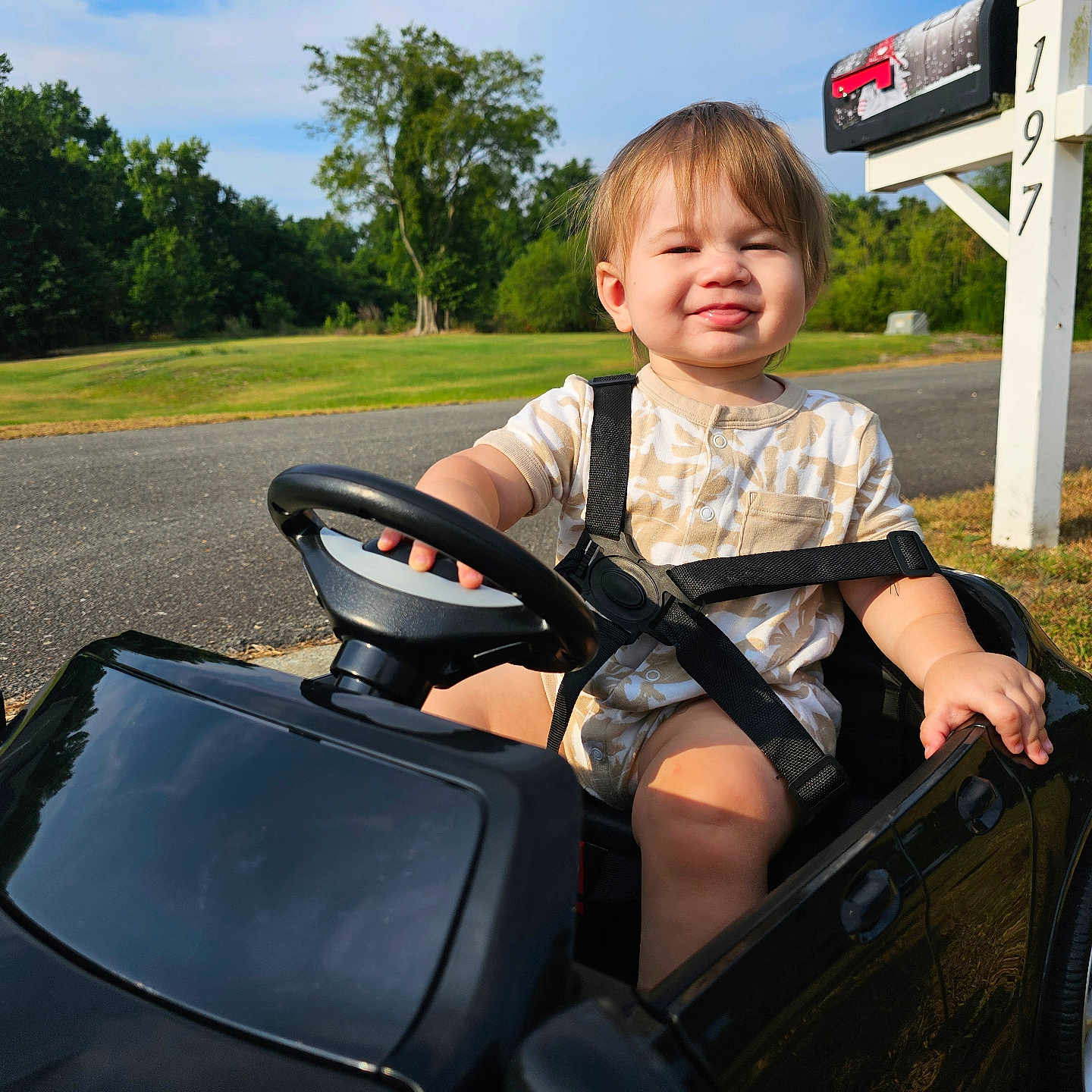 Luka joined the competition — help win amazing prizes! alloywheel, baby, car, carwheel, face, grass, head, machine, nature, outdoors, park, person, photography, plant, portrait, summer, transportation, tree, vehicle, wheel