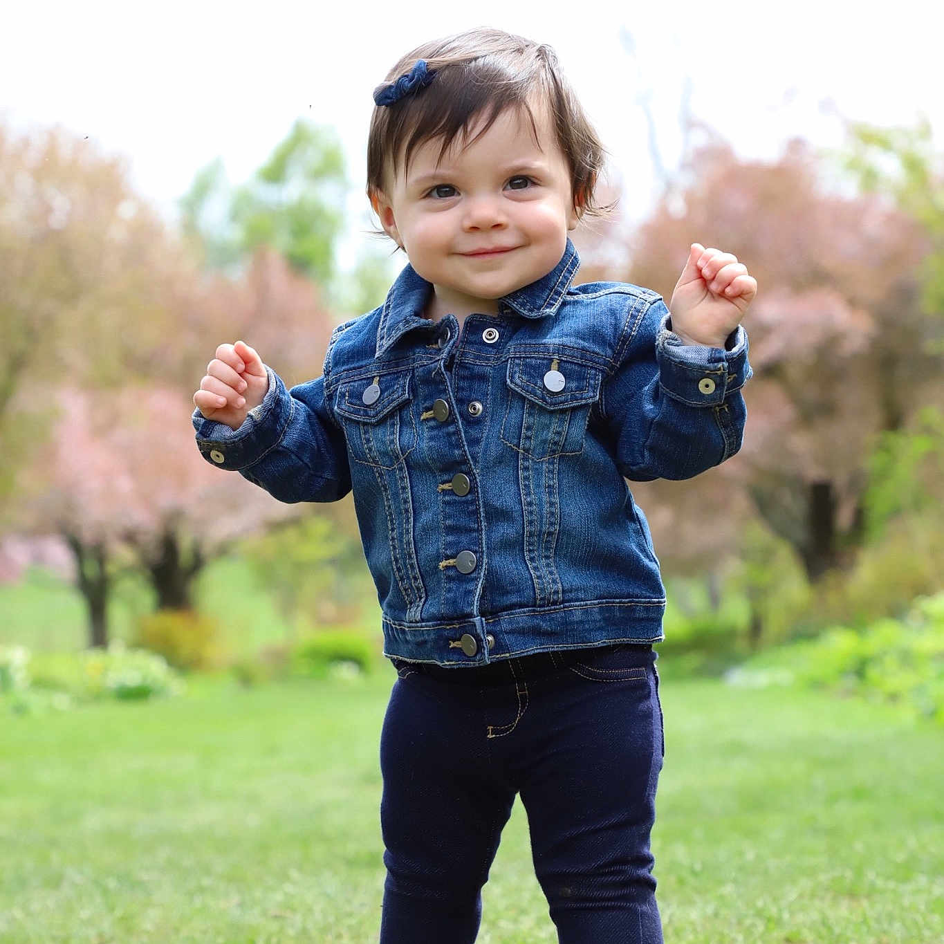 Giovanna joined the competition — help win amazing prizes! child, finger, fun, grass, grassland, happy, jacket, joy, male, outerwear, people, person, photography, plant, play, smile, standing, toddler