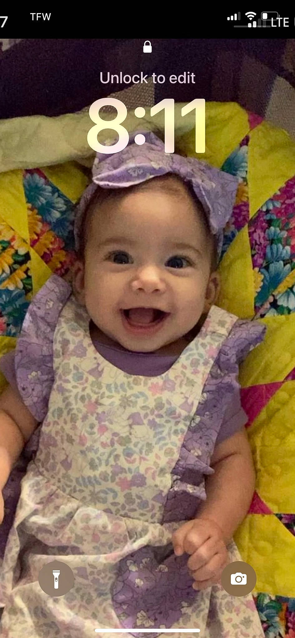 Amelia is registered to the contest to win money with this photo: baby, baby_toddler_clothing, cheek, chin, eye, face, fun, happy, head, headgear, headwear, iris, nose, person, pink, purple, skin, sleeve, smile, toddler