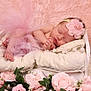 Ivey joined the competition — help win amazing prizes! baby, newborn, sleeping, flower_headband, pink_tutu, cushion, wooden_bed, pink_blanket, roses, flowers, green_leaves, soft_texture, portrait, infant, cute, peaceful, indoors, decor, resting, adorable