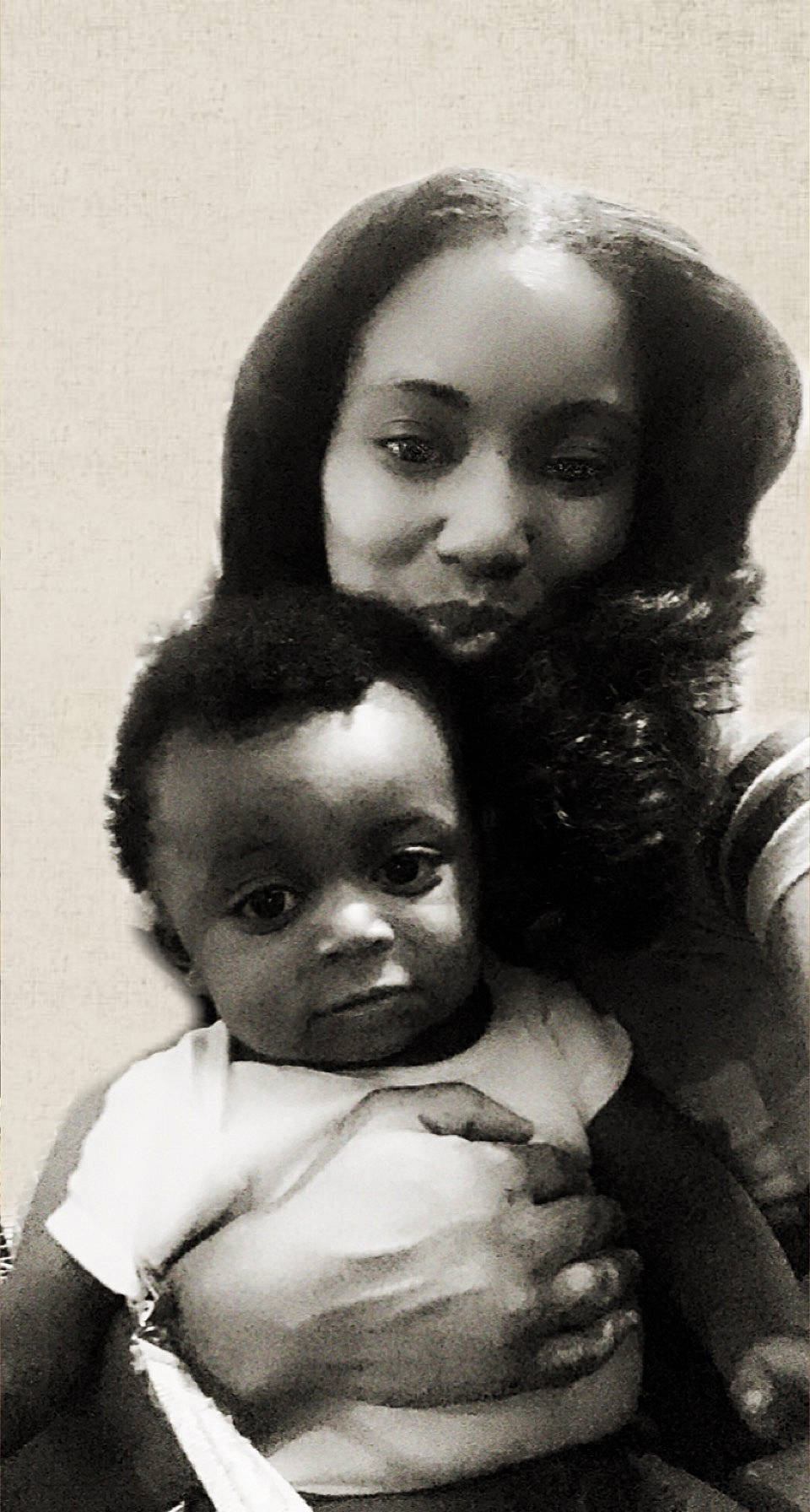 Harlem is registered to the contest to win money with this photo: baby, baby_toddler_clothing, black_hair, cheek, child, eyebrow, face, forehead, hand, head, human, iris, lip, monochrome, monochrome_photography, nose, people, person, photograph, skin