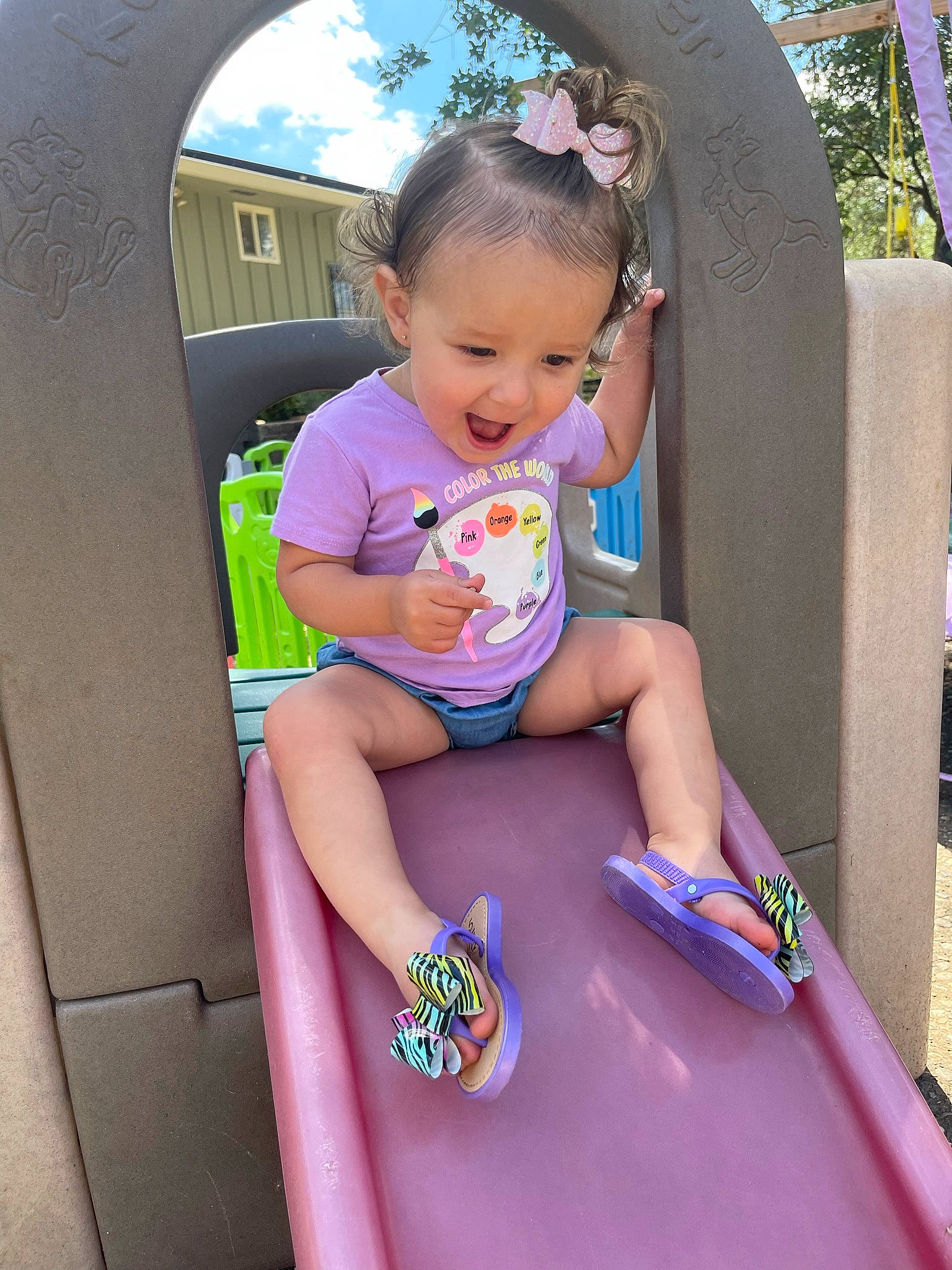 Oakley is registered to the contest to win money with this photo: baby_toddler_clothing, child, city, finger, fun, happy, leg, leisure, person, pink, play, product, public_space, recreation, snapshot, sneakers, standing, summer, thigh, toddler
