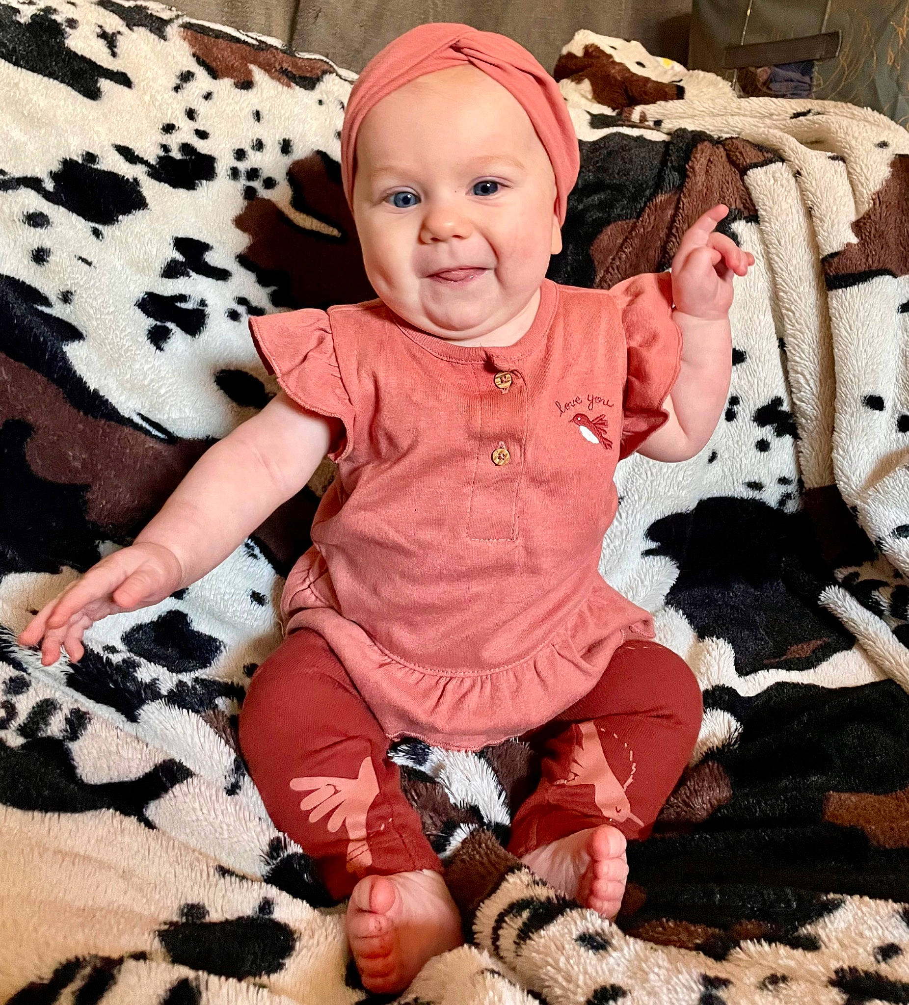 Aspyn joined the competition — help win amazing prizes! baby, baby_toddler_clothing, cheek, child, eye, happy, head, joy, linens, pattern, person, photograph, pink, product, sitting, skin, sleeve, smile, t_shirt, textile