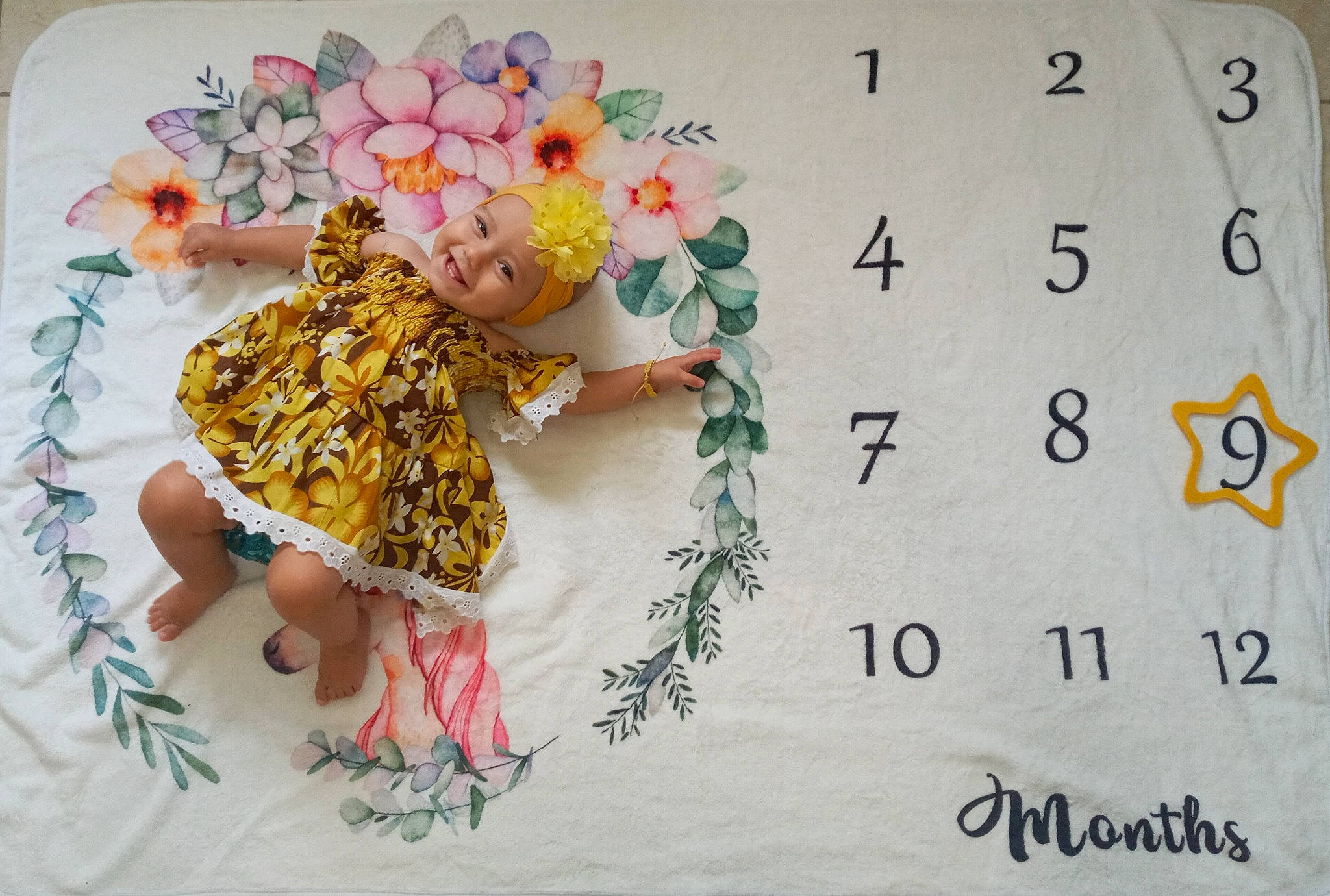 Léïa participe au concours pour gagner de l'argent avec cette photo : art, baby_toddler_clothing, craft, creative_arts, floral_design, flower, font, happy, headwear, joy, linens, magenta, needlework, paper, paper_product, pattern, pedicel, person, petal, plant