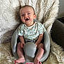 Ace joined the competition — help win amazing prizes! baby, infant, smiling, baby_seat, gray, fluffy_blanket, white_blanket, alligator_print, clothing, happy, person, child, cute, indoor, furniture, seat, foot, hand, head, portrait