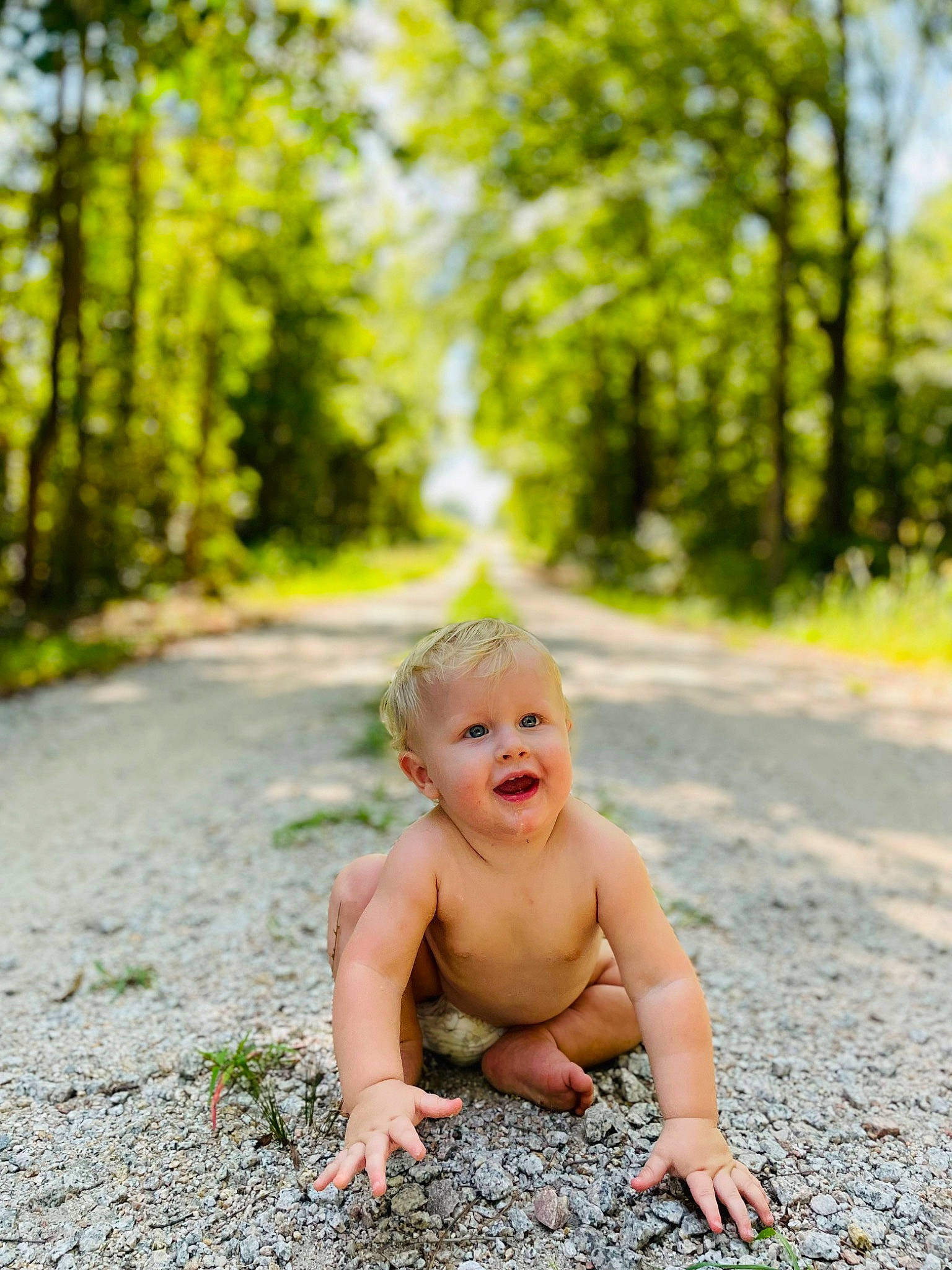 River joined the competition — help win amazing prizes! baby, baby_toddler_clothing, child, flash_photography, flooring, forest, fun, grass, happy, laugh, leisure, people_in_nature, person, plant, portrait_photography, recreation, sitting, smile, toddler, tree