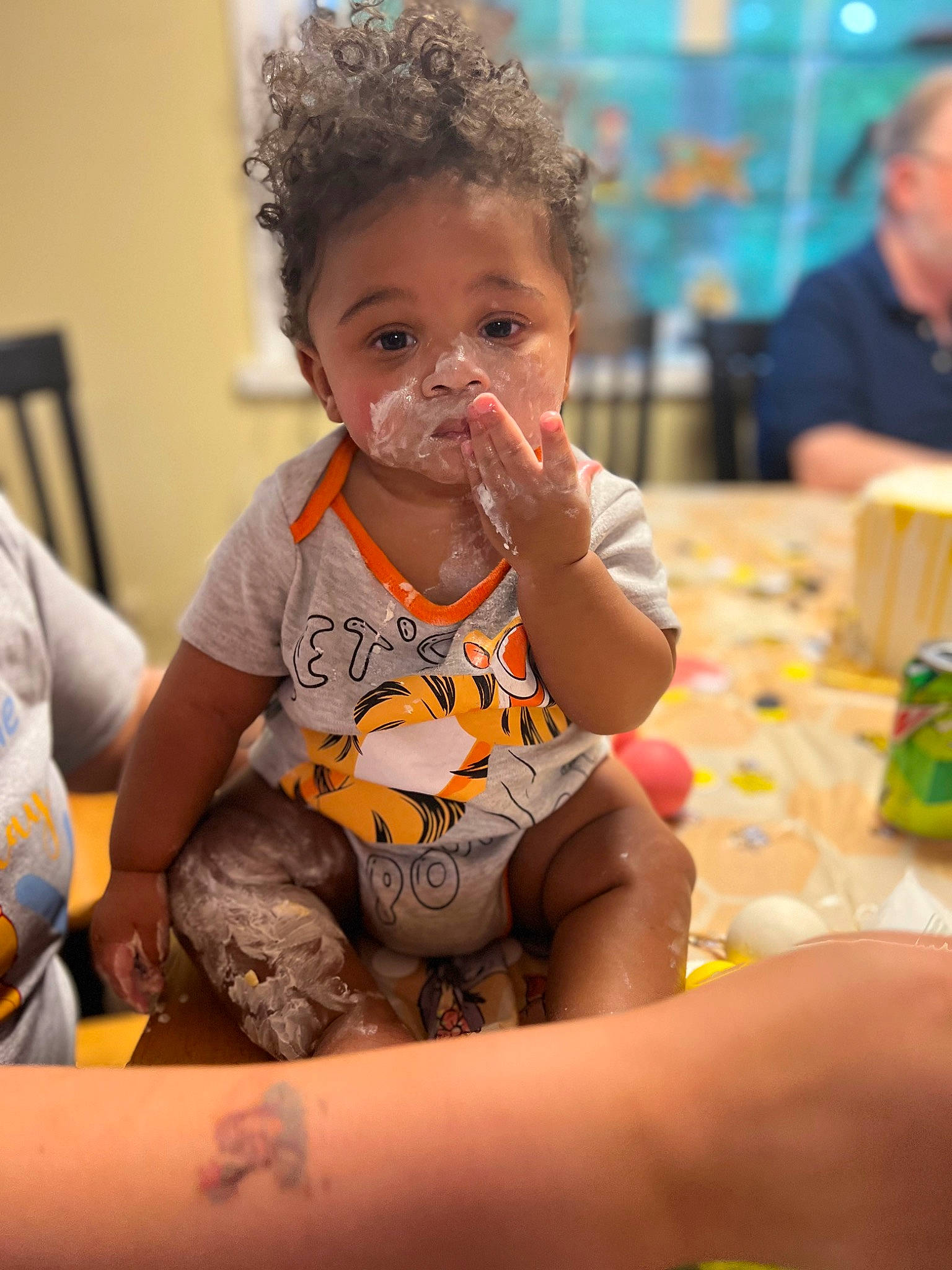 Izaiah is registered to the contest to win money with this photo: adaptation, baby, baby_toddler_clothing, chair, child, elbow, event, fun, happy, leisure, party, person, play, room, sitting, snapshot, t_shirt, tableware, thigh, toddler