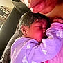 Jenesis joined the competition — help win amazing prizes! adult, baby, blanket, close_up, comfort, cuddle, face, indoor, infant, lips, love, newborn, parent, person, purple_clothing, rest, skin, sleeping, soft_light, tenderness