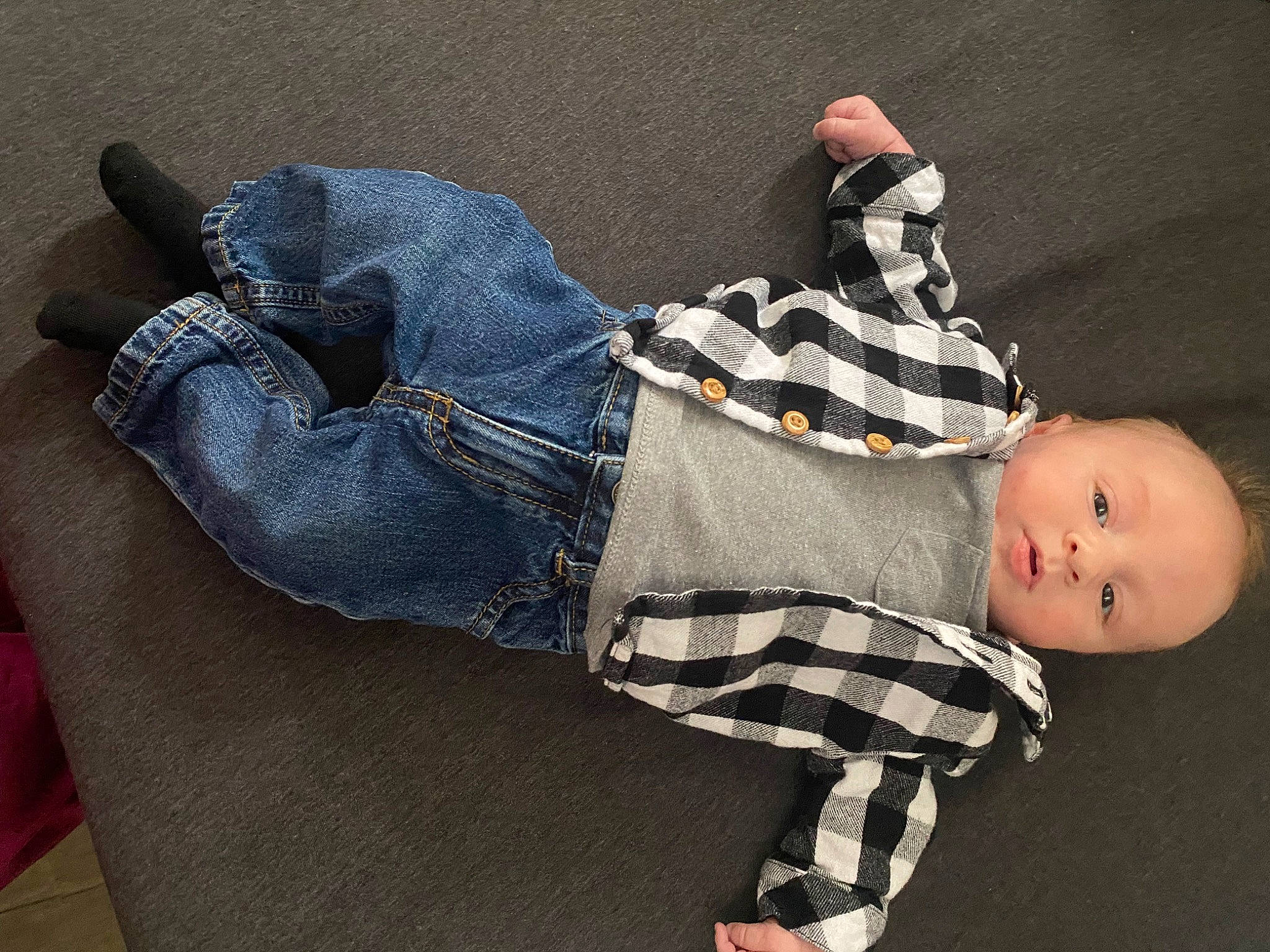 Theo is registered to the contest to win money with this photo: baby, comfort, denim, elbow, finger, foot, grey, head, human_body, human_leg, joint, knee, leg, pattern, person, skin, thigh, toddler, trunk, waist