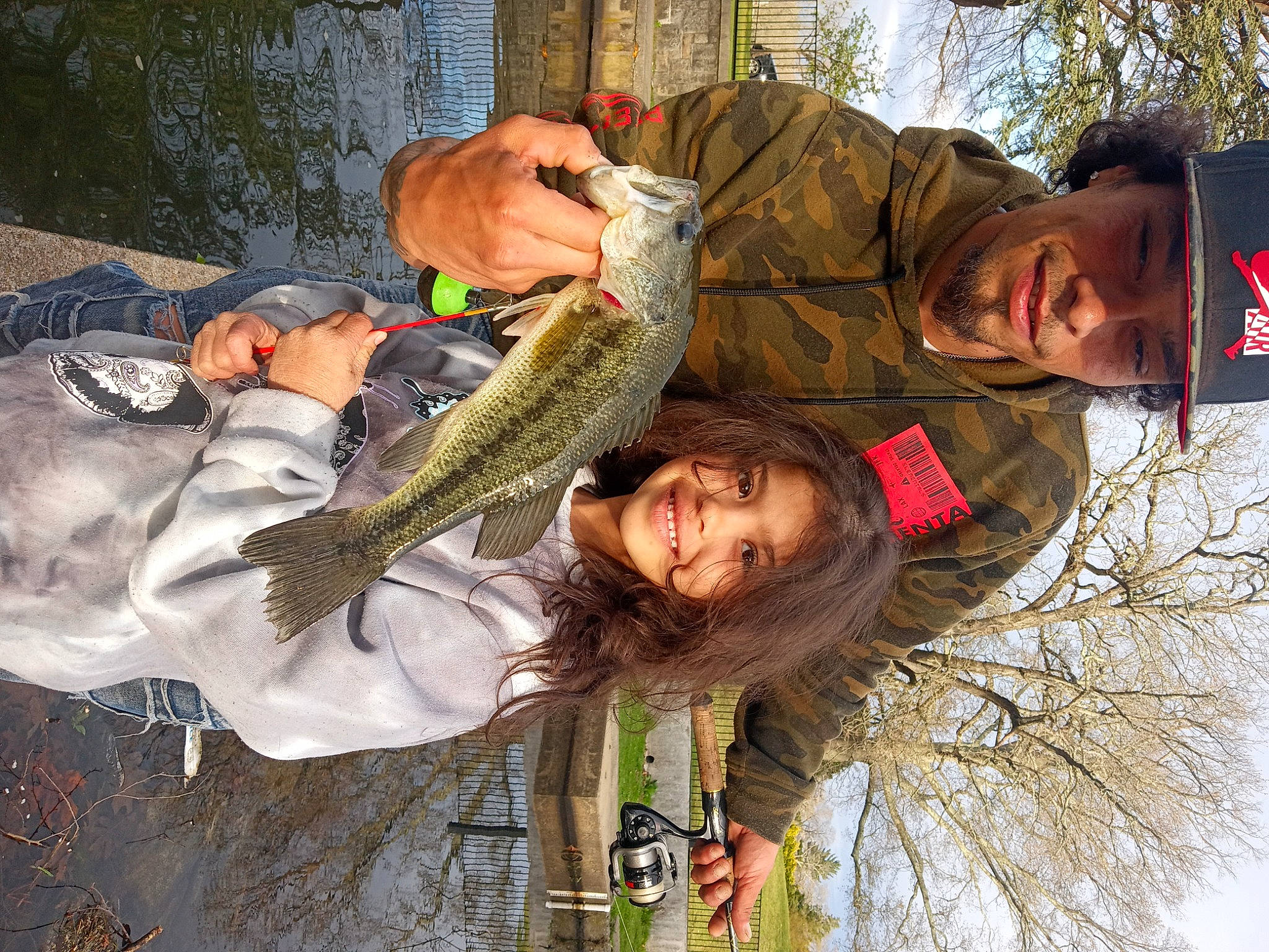 Annamarie is registered to the contest to win money with this photo: bony_fish, crocodile, fish, fisherman, fishing, happy, hat, headwear, joy, leisure, people_in_nature, person, ray_finned_fish, recreation, recreational_fishing, reptile, saltwater_crocodile, smile, tail, tree