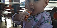 Bryleigh joined the competition — help win amazing prizes! toddler, child, high_chair, indoor, restaurant, window, sunlight, packet, food, jacket, floral_pattern, seat, table, floor, curious, person, face, hand, daylight, casual