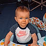 Bryleigh joined the competition — help win amazing prizes! baby, child, blue_eyes, nike_shirt, activity_center, toy, indoor, blanket, floor, person, young_child, infant, seat, hands, clothing, carpet, playing, cute, baby_toys, home