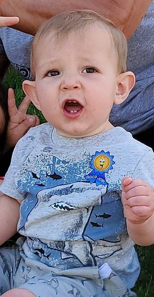 Thorsten joined the competition — help win amazing prizes! baby_toddler_clothing, cheek, chin, dress, facial_expression, finger, gesture, grass, hairstyle, hand, happy, iris, lip, mouth, neck, nose, organ, person, skin, sleeve