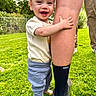 Pierson joined the competition — help win amazing prizes! toddler, child, baby, smiling, happy, outdoor, grass, yard, adult, parent, leg, hugging, portrait, playful, family, garden, trees, fence, sunlight, shoes