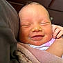 Hazel is registered to the contest to win money with this photo: baby, newborn, smile, sleeping, blanket, face, skin, hand, closeup, infant, cute, comfort, soft, peaceful, portrait, child, human, rest, warmth, cozy