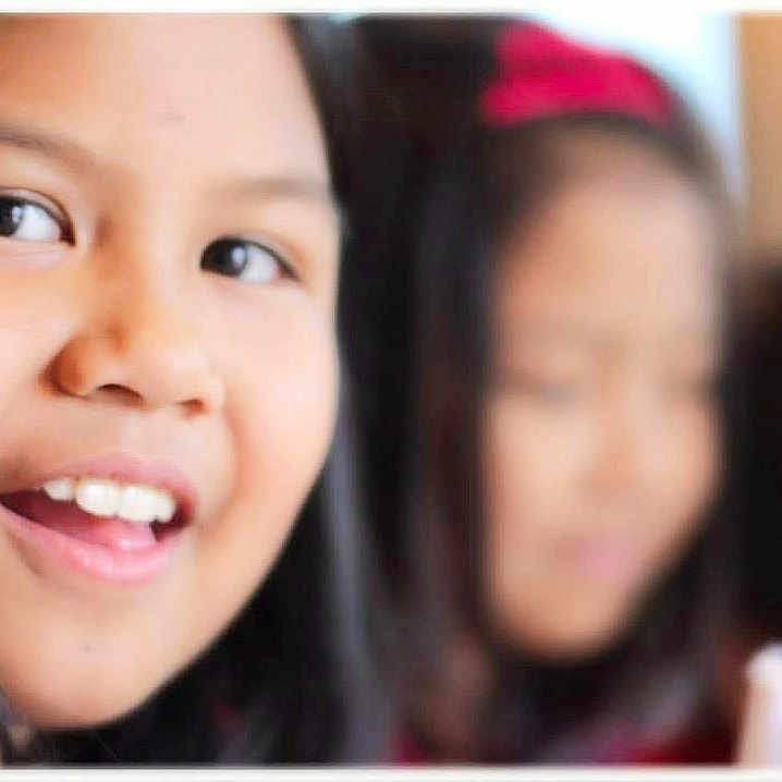 Avery is registered to the contest to win money with this photo: child, smiling, face, portrait, people, young, happy, girl, expression, hair, person, closeup, indoors, blurred_background, friendship, childhood, cute, joy, fun, casual