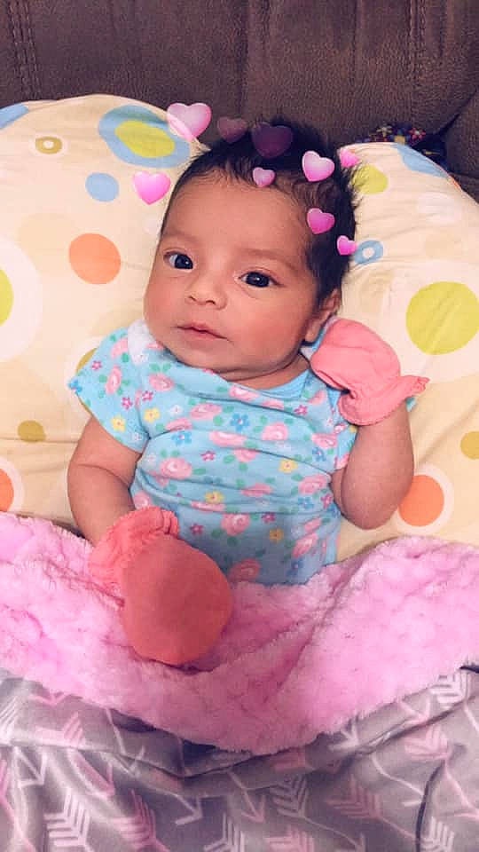 Anahi joined the competition — help win amazing prizes! baby, baby_products, baby_toddler_clothing, beauty, cheek, child, face, hair_accessory, head, pattern, person, pink, skin, smile, textile, toddler