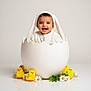 baby, child, bunny_ears, egg_shell, yellow_chicks, daisies, flowers, smiling, cute, studio, white_background, spring, costume, props, portrait, happy, infant, playful, decor, easter