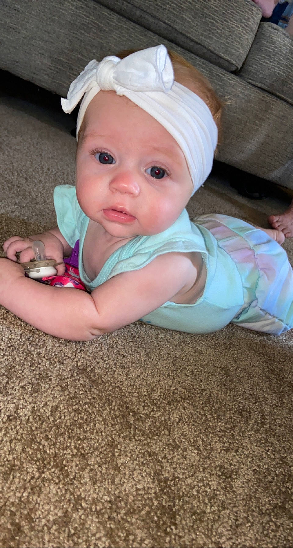 Brooklynn joined the competition — help win amazing prizes! baby, baby_products, baby_toddler_clothing, cap, cheek, child, comfort, fashion_accessory, fun, grass, headband, headpiece, headwear, iris, pattern, person, pink, sitting, skin, sleeve