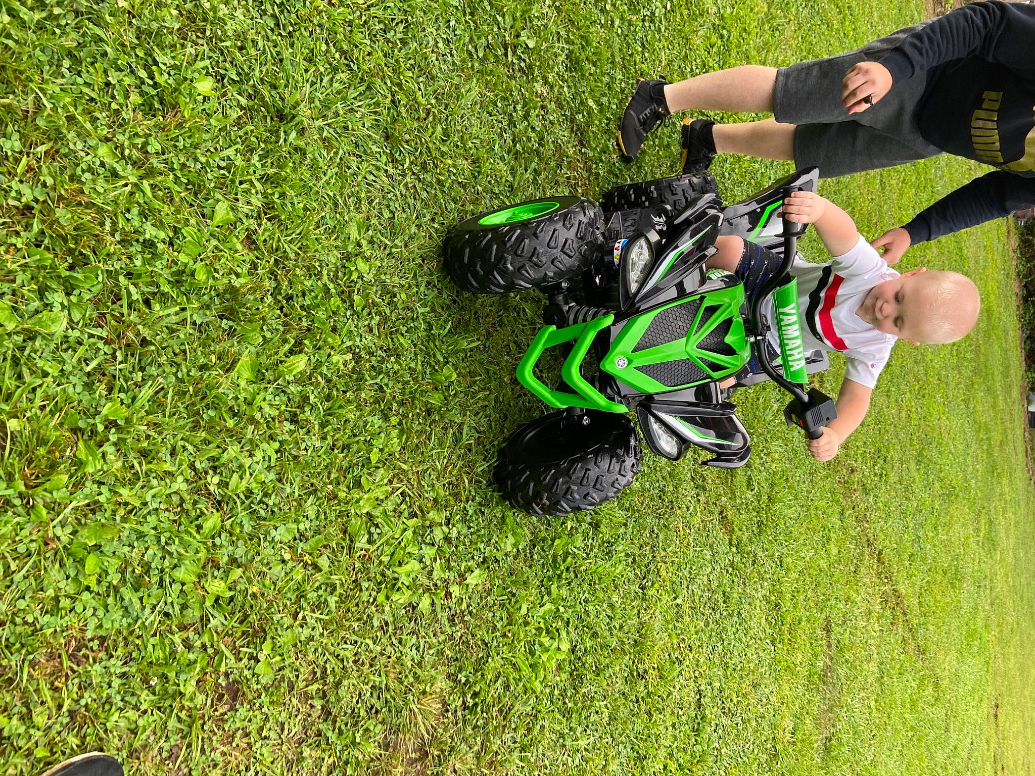 Braxton joined the competition — help win amazing prizes! baby, extreme_sport, grass, grass_family, grassland, groundcover, knee, lawn, leisure, meadow, pasture, people_in_nature, person, personal_protective_equipment, plant, recreation, shorts, shrub, sports, sports_gear