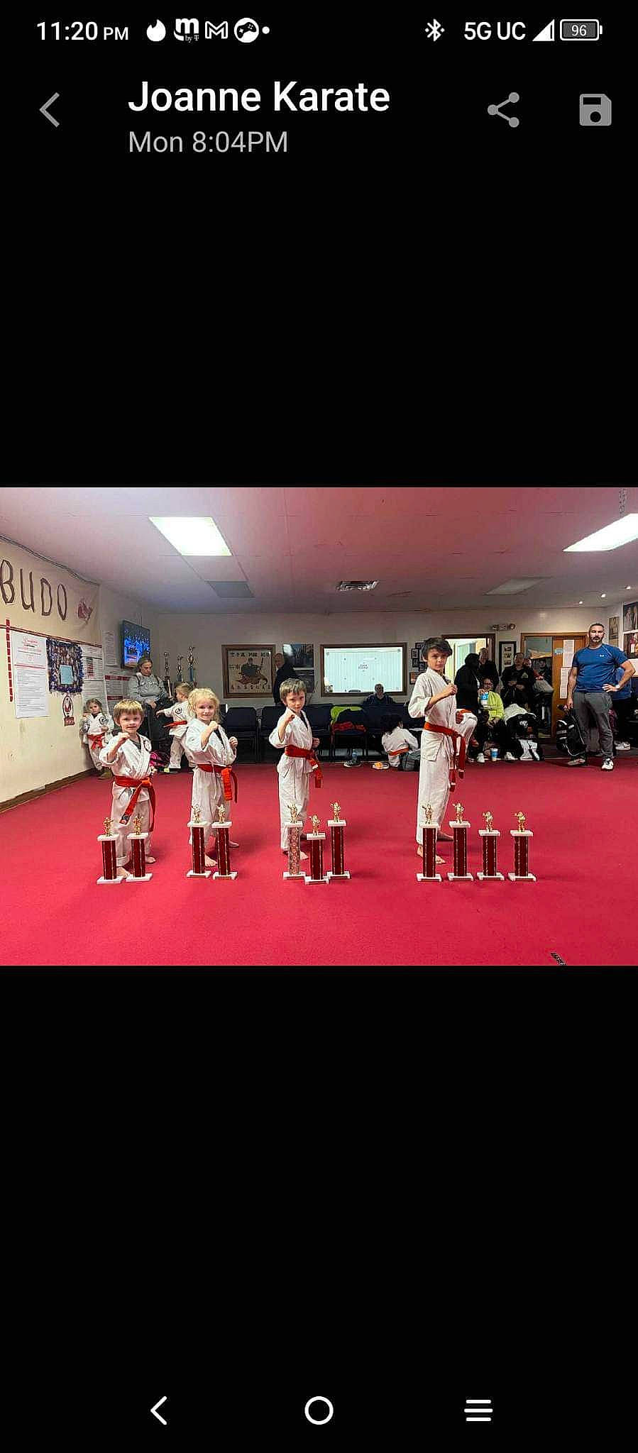 Quinten is registered to the contest to win money with this photo: carpet, chair, competition_event, display_device, entertainment, event, flooring, headwear, joy, performance, performance_art, performing_arts, person, player, public_event, room, sports, sports_uniform, stage, stage_equipment