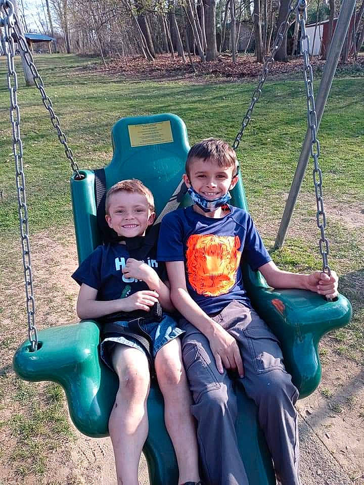 Quinten joined the competition — help win amazing prizes! city, eye, fun, grass, green, happy, joy, leg, leisure, outdoor_recreation, people, person, plant, playground, recreation, shorts, smile, summer, swing, t_shirt