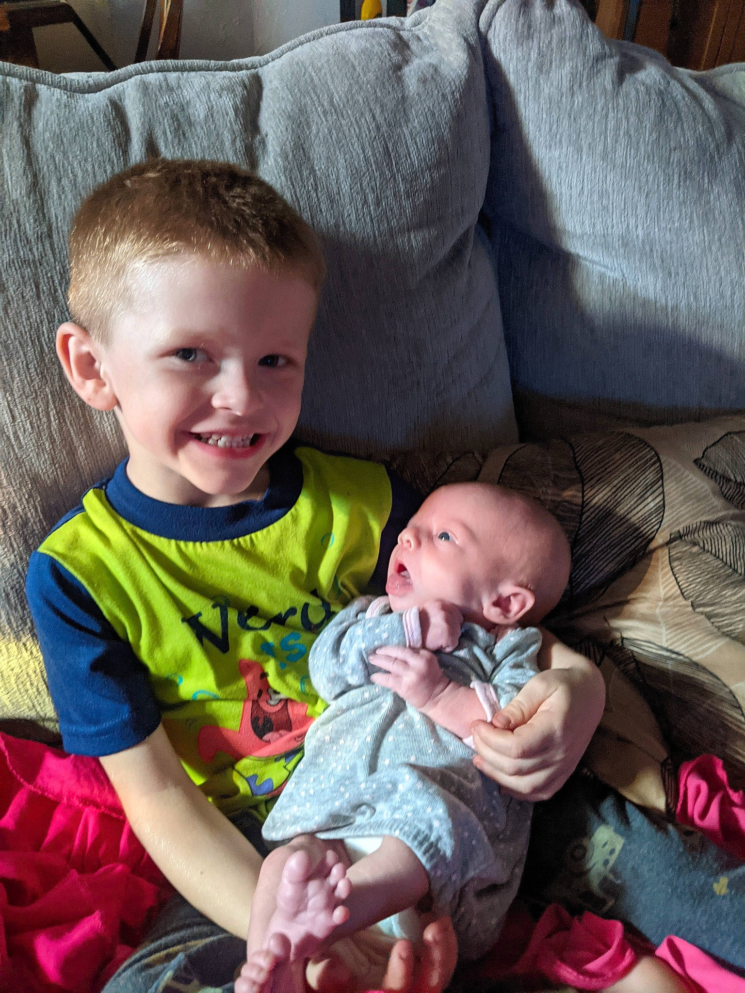 Malachi D. Tucker is registered to the contest to win money with this photo: baby, baby_toddler_clothing, chair, cheek, child, comfort, couch, eye, grass, hairstyle, happy, human_body, iris, joy, lap, leg, person, sitting, skin, smile