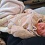 Théa a rejoint le concours — aidez-le/la à gagner de superbes lots ! newborn, baby, sleeping, sweater, daisy_pattern, blanket, cozy, soft, child, infant, warm, cute, clothing, relaxed, portrait, indoors, comfort, peaceful, resting, person