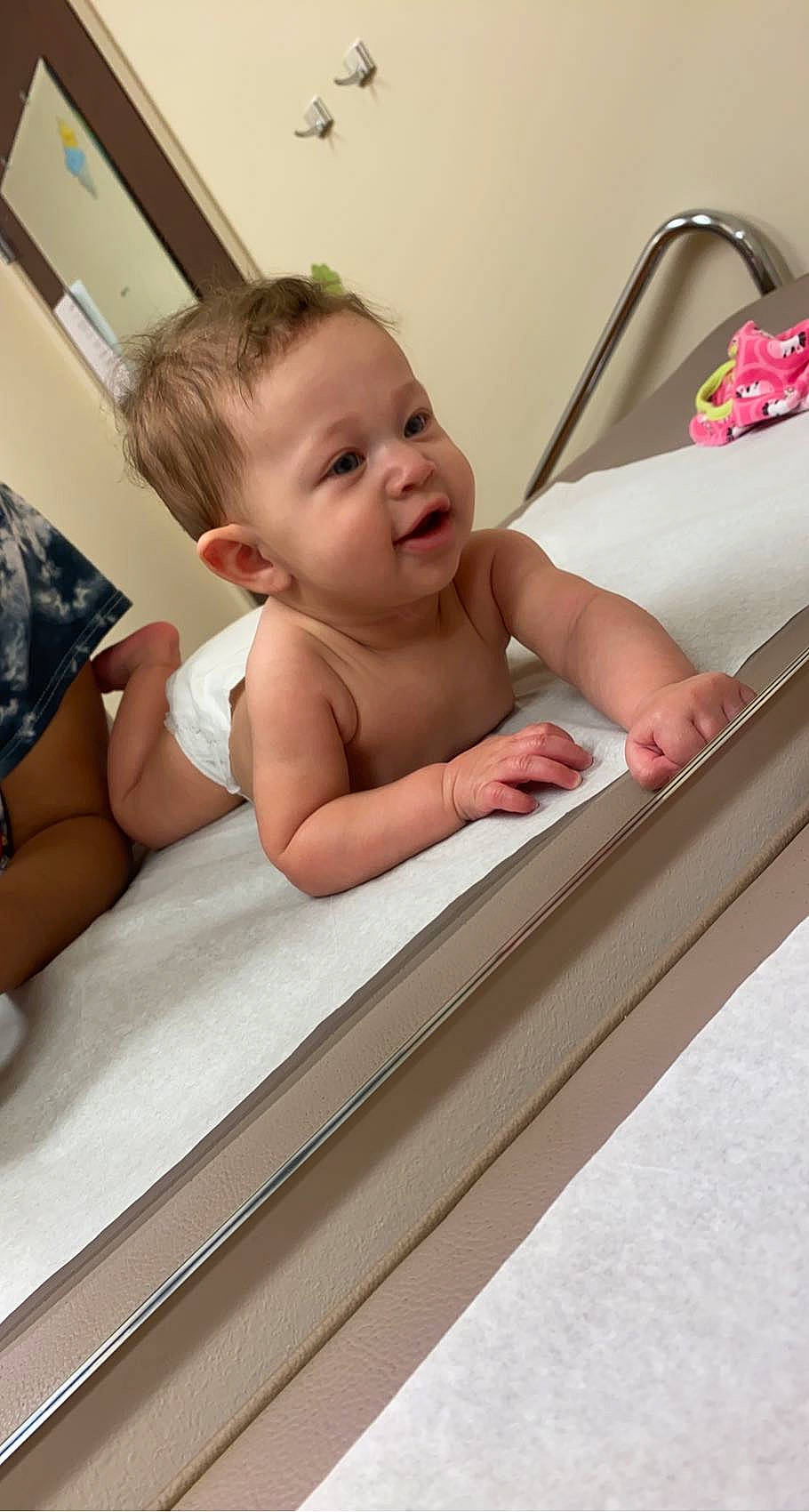 Kailani is registered to the contest to win money with this photo: arm, baby, baby_products, baby_safety, baby_toddler_clothing, cheek, child, comfort, eyelash, facial_expression, finger, fun, happy, person, room, sitting, skin, sleeve, smile, toddler