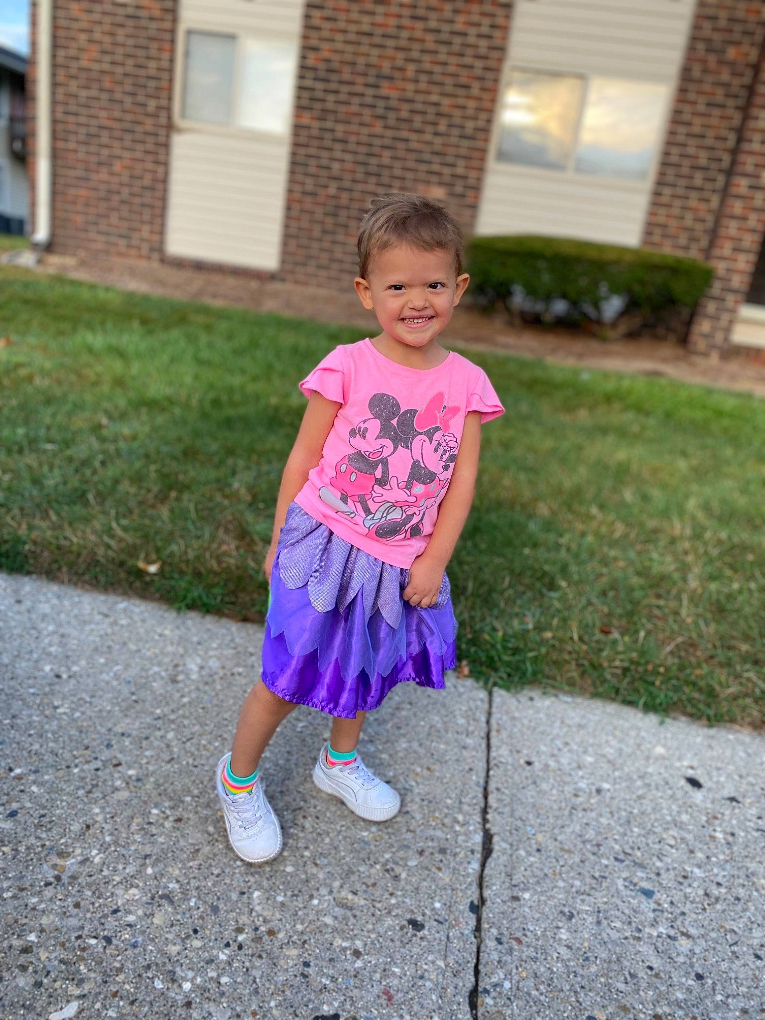 Kinsley is registered to the contest to win money with this photo: asphalt, baby_toddler_clothing, electric_blue, eye, grass, grass_family, hair, joy, leisure, magenta, pattern, person, pink, plant, recreation, road_surface, sandal, sidewalk, sleeve, toddler