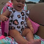 Paityn joined the competition — help win amazing prizes! baby, barefoot, child, clothing, clouds, colorful, fun, happy, leopard_print, outdoor, pink, portrait, seat, sitting, sky, smiling, summer, sunlight, towel, trees