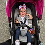 Paityn is registered to the contest to win money with this photo: baby, bottle, bow, child, converse, cute, footwear, happy, harness, infant, jeans, magenta_canopy, outdoor, pavement, person, smiling, stroller, toy, white_shirt, white_shoes