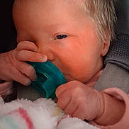 Layla Renee joined the competition — help win amazing prizes! baby, newborn, pacifier, blanket, car_seat, infant, child, clothing, hand, face, portrait, cute, soft, cozy, sleepy, indoor, person, newborn_baby, closeup, infancy