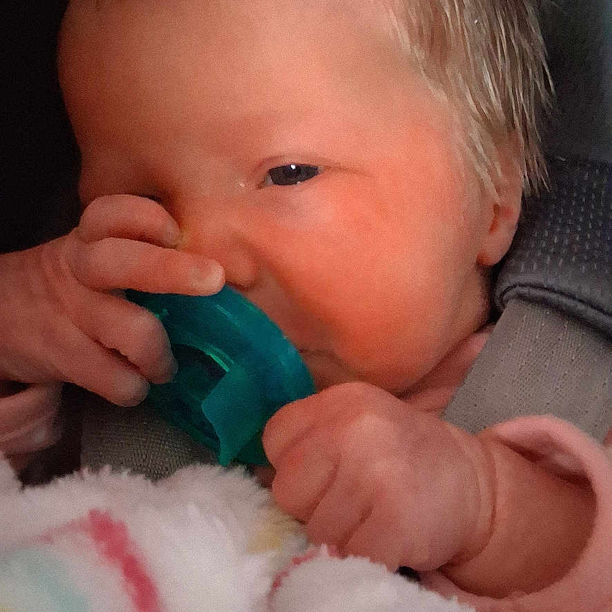 Layla Renee joined the competition — help win amazing prizes! baby, newborn, pacifier, blanket, car_seat, infant, child, clothing, hand, face, portrait, cute, soft, cozy, sleepy, indoor, person, newborn_baby, closeup, infancy