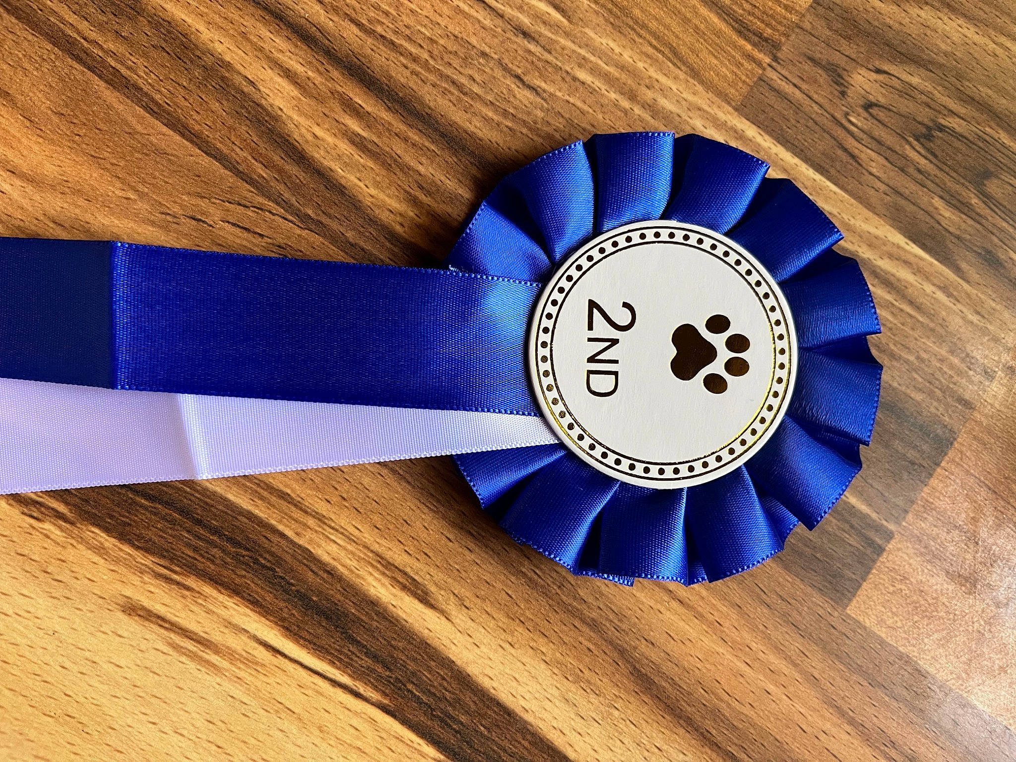 Bear joined the competition — help win amazing prizes! auto_part, bottle_cap, carmine, circle, electric_blue, fashion_accessory, font, gas, hand_tool, hardwood, logo, symbol, tool, varnish, wood, wood_stain