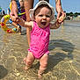Josie-Leigh joined the competition — help win amazing prizes! adult, baby, child, floaties, fun, happy, hat, holding_hands, outdoor, people, pink, playground, shallow_water, smiling, summer, sunny, swimsuit, tattoos, water, water_play