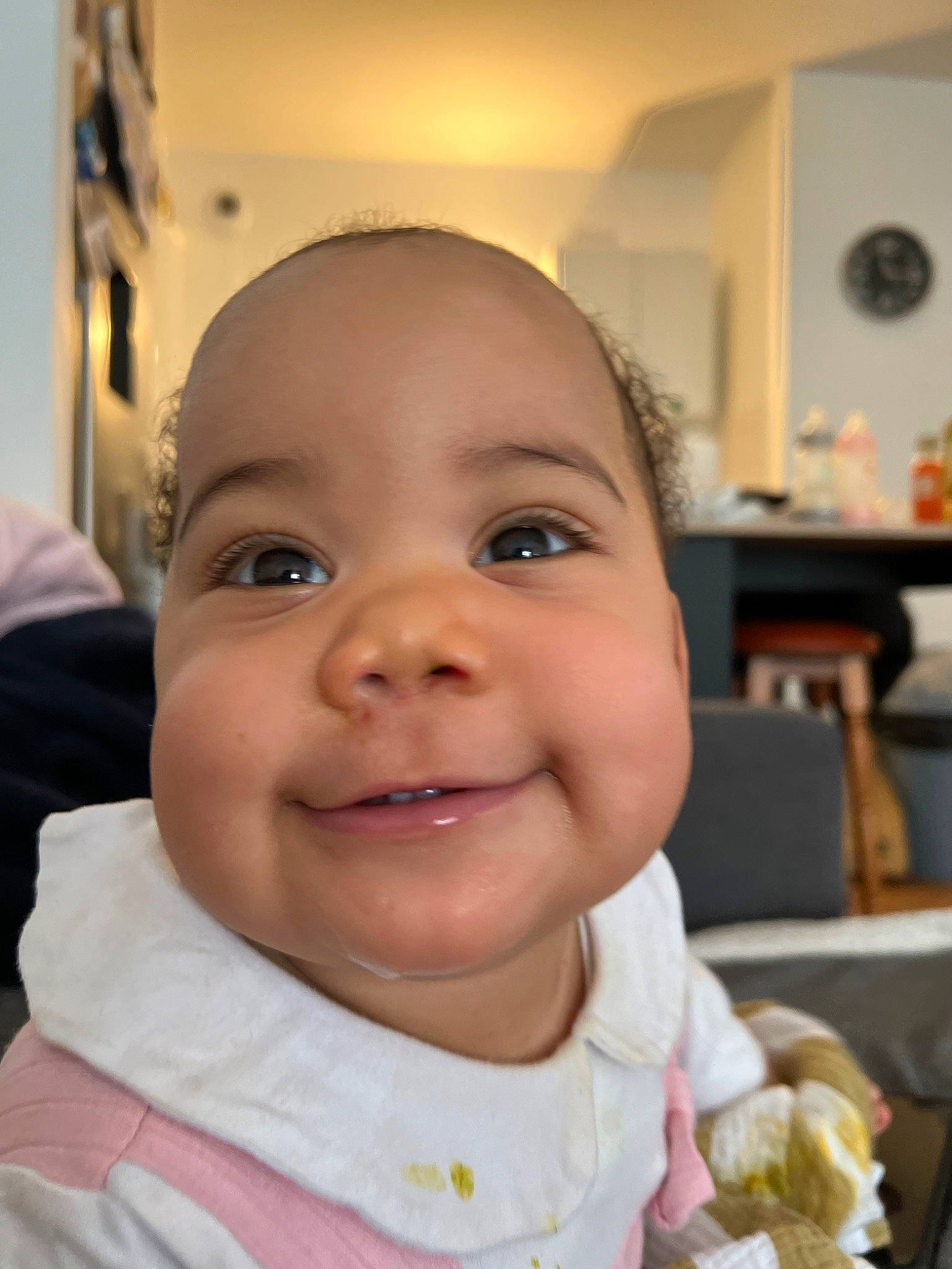 Jannah participe au concours pour gagner de l'argent avec cette photo : baby, baby_toddler_clothing, bib, chair, cheek, child, drinkware, ear, eyelash, fun, happy, iris, joy, lip, mouth, nose, person, skin, sleeve, smile